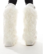Tommie fluffy knee boots in white