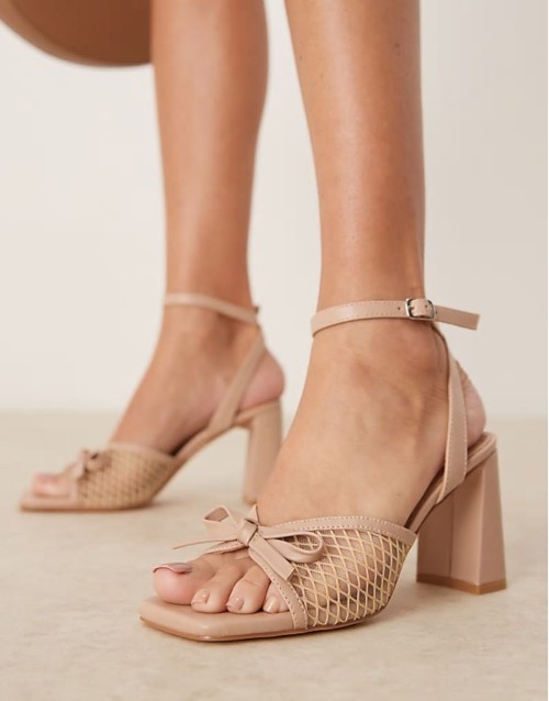 mid block heeled bow sandals in neutral